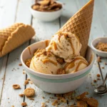 A bowl of creamy Cookie Butter Ice Cream