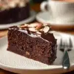 Moist and decadent Almond Flour Chocolate Cake served on a plate