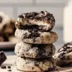 Delicious Oreo cheesecake cookies topped with crushed Oreo pieces